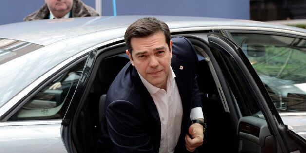 Greek Prime Minister Alexis Tsipras arrives for an European Union Summit at the EU headquaters in Brussels, on March 18, 2016.Leaders from six EU nations led by Britain were holding talks Friday on how to tackle migration from Libya at a Brussels summit focused on dealing with an unprecedented influx of people fleeing war in Syria. Around 330,000 have come to Italy via Libya since the start of 2014 while more than a million have reached Europe, landing in Greece via Turkey. / AFP / THIERRY CHARL
