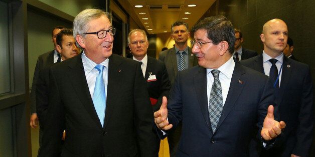 BRUSSELS, BELGIUM - JANUARY 15: President of the Eurogroup Council Jean-Claude Junker (L) and Turkish Prime Minister Ahmet Davutoglu (R) meet in Brussels, Belgium on January 15,2015. (Photo by Hakan Goktepe/Anadolu Agency/Getty Images)