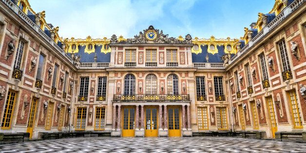One of Louis XIV's grand entrance(s) to the palace of Versailles. Louis the XIV was also known as the Sun King.