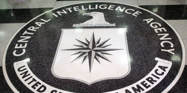 The logo of the U.S. Central Intelligence Agency is shown in the lobby of the CIA headquarters in Langley, Virginia March 3, 2005. U.S. President George W. Bush visited the headquarters for briefings Thursday. REUTERS/Jason Reed JIR