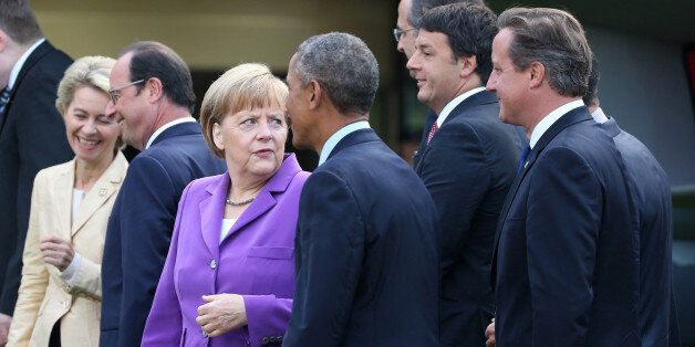 CARDIFF, WALES - SEPTEMBER 5: US President Barack Obama (L4), British Prime Minister David Cameron (R), French President Francois Hollande (L2), Italian Prime Minister Matteo Renzi (R2) and German Chancellor Angela Merkel (L3) arrive to watch a flypast of military aircraft on the second day of the NATO 2014 Summit at the Celtic Manor Resort in Newport, South Wales, on September 5, 2014. (Photo by Yunus Kaymaz/Anadolu Agency/Getty Images)