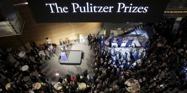 The largest-ever gathering of Pulitzer Prize recipients gather for a celebration honoring the centennial of the Pulitzer Prize at the Newseum in Washington DC January 28, 2016. REUTERS/Joshua Roberts