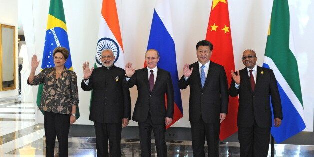 (L-R) Brazil's President Dilma Rousseff, Indian Prime Minister Narendra Modi, Russian President Vladimir Putin, Chinese President Xi Jinping and South African President Jacob Zuma pose during a family photo session at the BRICS leaders meeting ahead of G20 summit in Antalya, Turkey, November 15, 2015. REUTERS/Mikhail Klimentyev/RIA Novosti/Kremlin ATTENTION EDITORS - THIS IMAGE HAS BEEN SUPPLIED BY A THIRD PARTY. IT IS DISTRIBUTED, EXACTLY AS RECEIVED BY REUTERS, AS A SERVICE TO CLIENTS.