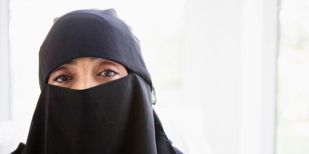 Portrait of a middle eastern woman wearing a black