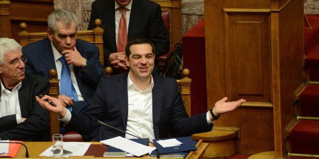 HELLENIC PARLIAMENT, ATHENS, ATTIKI, GREECE - 2016/03/29: Greek Prime Minister Alexis Tsipras is reacting to the speech of his political opponent and leader of New Democracy Party Kyriakos Mitsotakis. (Photo by Dimitrios Karvountzis/Pacific Press/LightRocket via Getty Images)