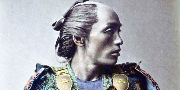 Hand-Colour photograph of a Japanese Samurai warrior by Franz von Stillfried-Ratenicz. Dated 1881. (Photo by: Universal History Archive/UIG via Getty Images)