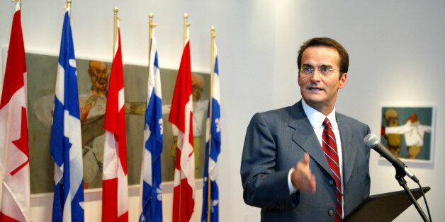 Jean Lapierre announces he will run for the federal Liberals in the Montreal riding of Outremont during a news conference in Montreal, February 5, 2004. Lapierre, a founding member of the Bloc Quebecois, was also named Prime Minister Paul Martin's Quebec lieutenant. REUTERS/Shaun Best SB/GAC