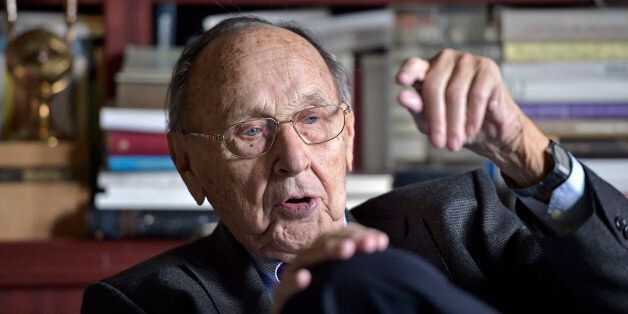 Former German foreign secretary Hans-Dietrich Genscher talks about the German reunification at his home in Wachtberg, Germany, Thursday, Nov. 6, 2014, during an interview with The Associated Press about the fall of the Berlin wall in 1989. (AP Photo/Martin Meissner)