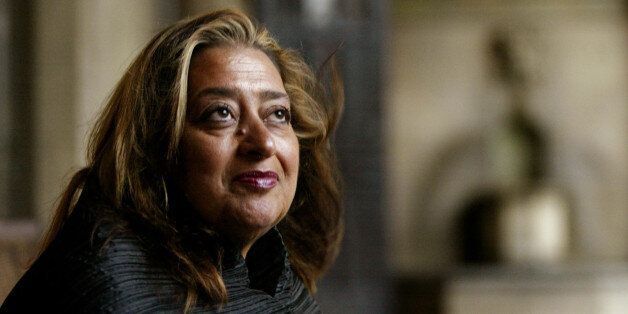 FILE- In this March 21, 2004 file picture, Iraqi-British architect Zaha Hadid poses in West Hollywood, Calif. Hadid, whose modernist, futuristic designs included the swooping aquatic center for the 2012 London Olympics, has died aged 65, Thursday, March 31, 2016. (AP Photo/Kevork Djansezian, File)