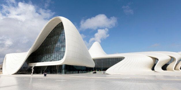 The Heydar Aliyev Center is a 619, 000-square-foot building complex in Baku, Azerbaijan designed by Iraqi-British architect Zaha Hadid and noted for its distinctive architecture and flowing, curved style that eschews sharp angles. The center is named for Heydar Aliyev, the leader of Soviet-era Azerbaijan from 1969 to 1982, and president of Azerbaijan from October 1993 to October 2003.