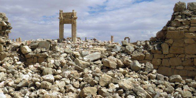 A picture shows on March 29, 2016 the remains of the Temple of Bel in the historical city of Palmyra after ir was blown up by Islamic State (IS) group jihadists. Regime troops were locked in heavy fighting with the Islamic State group in central Syria, where they dealt the jihadists a major blow by seizing the ancient city of Palmyra. / AFP / STRINGER (Photo credit should read STRINGER/AFP/Getty Images)