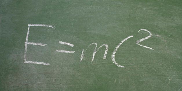 Albert Einstein's famous theory of relativity - E=mc2 - written in chalk