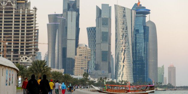 DOHA, QATAR - JANUARY 24: Views of the skyscraper skyline in Doha City, on the Corniche in Doha Bay. The county of Qatar will play host to the FIFA World Cup in 2022. (Photo by Matthew Ashton - AMA via Getty Images)