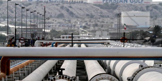 A picture shows export oil pipelines at an oil facility in the Khark Island, on the shore of the Gulf, on February 23, 2016. Iran's Oil Minister Bijan Namdar Zanganeh dismissed an output freeze deal between the world's top two producers Saudi Arabia and Russia as 'a joke', the ISNA news agency reported. / AFP / STR (Photo credit should read STR/AFP/Getty Images)