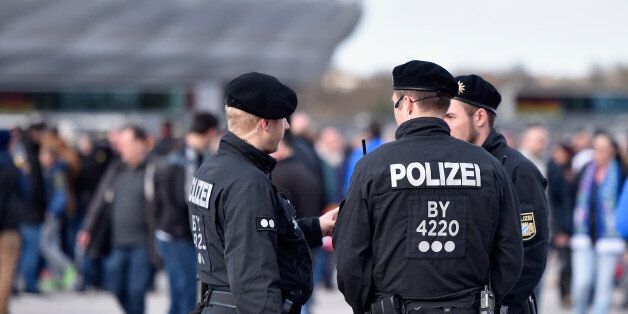 MUNICH, BAVARIA - MARCH 29: Police forces outside the stadium prior to kickoff during the International...
