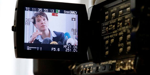 Frauke Petry, chairwoman of the right-wing Alternative for Germany (AfD) party is pictured on a TV camera display as she addresses a news conference at the Foreign Media Association in Berlin, Germany, February 22, 2016. REUTERS/Fabrizio Bensch