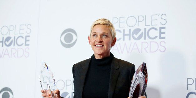 Ellen DeGeneres poses backstage with her Humanitarian Award and Award for Favorite Daytime TV Host during the People's Choice Awards 2016 in Los Angeles, California January 6, 2016. REUTERS/Danny Moloshok