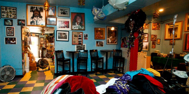 The back room of the Ernie K-Doe Mother-In-Law Lounge in New Orleans with items piled in the foreground in preparation for the garage sale planned for Saturday on Wednesday, Sept. 2, 2009. The lounge was owned by recording artist Ernie K-Doe, the Emperor of the Universe. K-Doe and his wife Antoinette K-Doe have died , and the lounge is now run by Ernie K-Doe's stepdaughter Betty Fox. ( AP Photo/Judi Bottoni )