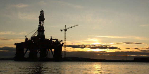 An oil platform in the sunset, taken outside AskÃ¸y in Hordaland, Norway.