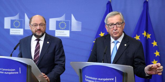 European Commission President Jean-Claude Juncker, right, and European Parliament President Martin Schultz address a media conference at EU headquarters in Brussels on Thursday, March 17, 2016. In the first day of a two-day summit, European Union leaders hope to seal a deal with Turkey to send back tens of thousands of migrants amid deep divisions over how to manage Europe's biggest refugee emergency in decades. (AP Photo/Francois Walschaerts)