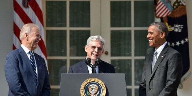 Judge Merrick Garland (C) speaks after US President Barack Obama, with Vice President Joe Biden (L), announced Garland's nomination to the US Supreme Court, in the Rose Garden at the White House in Washington, DC, on March 16, 2016.Garland, 63, is currently Chief Judge of the United States Court of Appeals for the District of Columbia Circuit. The nomination sets the stage for an election-year showdown with Republicans who have made it clear they have no intention of holding hearings to vet any Supreme Court nominee put forward by the president. / AFP / Nicholas Kamm (Photo credit should read NICHOLAS KAMM/AFP/Getty Images)