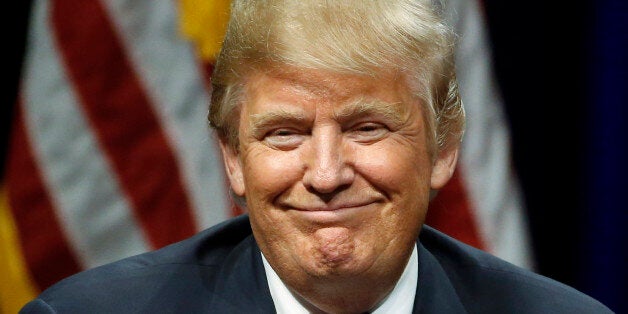 Republican presidential candidate Donald Trump smiles during a campaign stop Tuesday, Feb. 16, 2016, in Beaufort, S.C. (AP Photo/Matt Rourke)