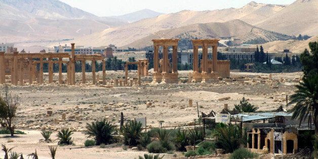 File-This file photo released on Sunday, May 17, 2015, by the Syrian official news agency SANA, shows the general view of the ancient Roman city of Palmyra, northeast of Damascus, Syria. Islamic State militants have blown up one of the most important temples in the ancient Syrian city of Palmyra, accelerating their relentless campaign of destruction against the historical treasures that have fallen under their control, activists and monitors said on Sunday, Aug. 30, 2015. (SANA via AP, File)