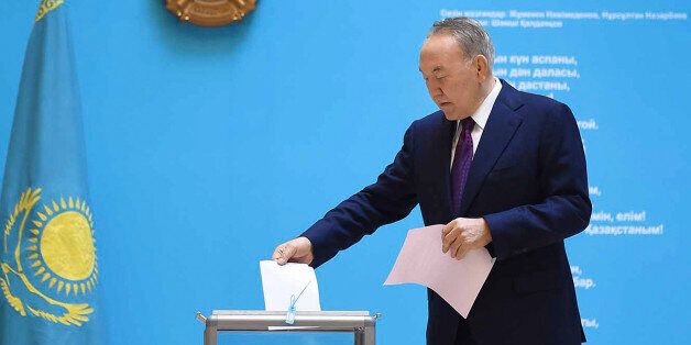 Kazakhstan's President Nursultan Nazarbayev casts his ballot in Astana, Kazakhstan, Sunday, March 20, 2016. Voting has begun, Sunday, March 20, 2016, in the parliamentary election in the former Soviet republic of Kazakhstan where the governing party is expecting an easy win. The Nur Otan party of President Nursultan Nazarbayev, the only leader post-Soviet Kazakhstan has had, is expected to cruise to an easy victory and retain its control of the lower house of parliament. ( Kazakhstan's President Official Site Photo via AP)