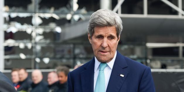 US Secretary of State John Kerry attends a ceremony at the Brussels National Airport to pay tribute to the victims of the terrorist attacks on March 25, 2016 in Zaventem.Kerry declared 'Je suis Bruxellois' -- 'I am a citizen of Brussels' -- in support for the people of the Belgian capital, echoing their backing for the United States after the 9/11 terror attacks. Triple bomb attacks in Brussels on March 22, 2016, left 31 people dead and 300 injured. / AFP / BELGA AND AFP / FREDERIC SIERAKOWSKI / Belgium OUT (Photo credit should read FREDERIC SIERAKOWSKI/AFP/Getty Images)