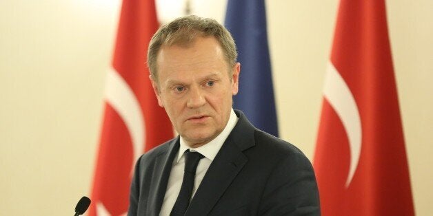 ANKARA, TURKEY - MARCH 15: Prime Minister of Turkey Ahmet Davutoglu (not seen) and President of the European Council Donald Tusk (C) hold a joint press conference after their meeting at Cankaya Palace in Ankara, Turkey on March 15, 2016. (Photo by Halil Sagirkaya/Anadolu Agency/Getty Images)