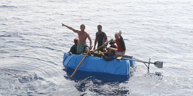 ATLANTIC OCEAN - JULY 2007: Cubans 30 miles off the coast of the United States try to reach Florida in a tiny boat on July 30, 2007 in the Atlantic Ocean. (Photo by Ronald C. Modra/Sports Imagery/Getty Images)