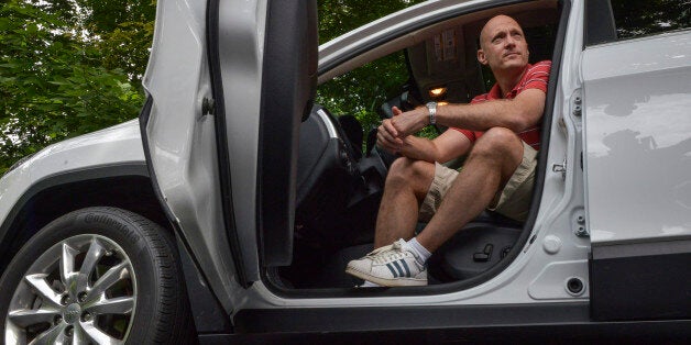 ST. LOUIS, MO - JULY 21: Charlie Miller with the car he has figured out how to hack on July, 21, 2015 in ST. LOUIS, MO. (Photo by Bill O'Leary/The Washington Post via Getty Images)