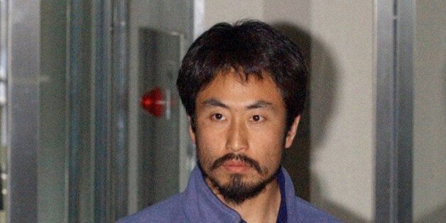 This picture taken on April 20, 2004 shows Japanese journalist Jumpei Yasuda at the Narita international airport at Narita, suburban Tokyo. Japan said on December 24, 2015 it was investigating the reported kidnapping of a Japanese journalist in Syria by an armed group, after two of its citizens were beheaded earlier this year. Media rights group Reporters Without Borders said Jumpei Yasuda, a freelance journalist, was kidnapped in July as he was crossing the border into the country and is still being held hostage by the group, which was not named. AFP PHOTO / JIJI PRESS JAPAN OUT / AFP / JIJI PRESS / JIJI PRESS (Photo credit should read JIJI PRESS/AFP/Getty Images)