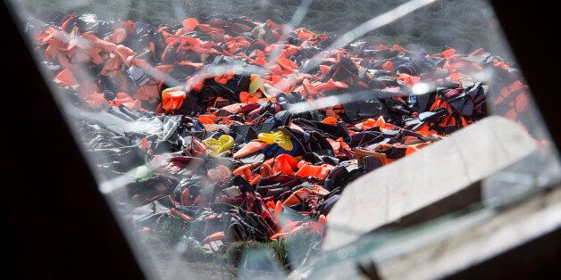 MITHYMNA, GREECE - MARCH 10: Hundreds of used life vests lie on a makeshift rubbish dump hidden in the hills above the town on March 10, 2016 in Mithymna, Greece. Local authorities start to clean the beaches from life vests and destroyed dinghies, used by refugees and migrants after crossing the sea from Turkey to Lesbos. The village of Mithymna is the northest town of the Island of Lesbos and located 75 kilometres north of the Capitol Mytilini. Migrants and refugees are still arriving on the shores of the Island of Lesbos, while Joined Forces of the Standing NATO (North Atlantic Treaty Organisation) Maritime Group 2 are patrolling the coast of the greek Island of Lesbos and the turkish coast. Turkey has announced on Monday to take back illegal migrants from Syria and to exchange those with legal migrants. (Photo by Alexander Koerner/Getty Images)