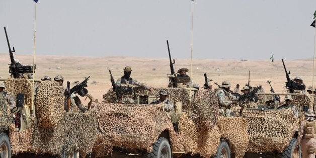 Special forces perform during the Northern Thunder military exercises in Hafar al-Batin, 500 kilometres north-east of the Saudi Capital Riyadh on March 10, 2016. Armed forces from 20 countries have begun manoeuvres in northeastern Saudi Arabia that the official Saudi Press Agency described as one of the world's biggest military exercises. Troops from Pakistan, Malaysia, Turkey, Egypt, Morocco, Jordan and Sudan are among those participating in the 'Thunder of the North' exercise, which involves ground, air and naval forces, SPA reported. / AFP / FAYEZ NURELDINE (Photo credit should read FAYEZ NURELDINE/AFP/Getty Images)