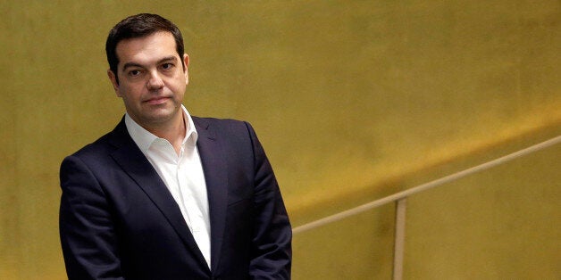 Greece's Prime Minister Alexis Tsipras waits to speak during the 70th session of the United Nations General Assembly at U.N. headquarters, Thursday, Oct. 1, 2015. (AP Photo/Seth Wenig)