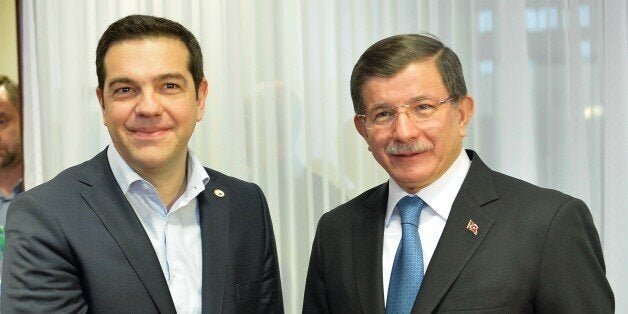 BRUSSELS, BELGIUM - MARCH 7: Prime Minister of Turkey Ahmet Davutoglu (R) and Greek Prime Minister Alexis Tsipras (L) attend a bilateral meeting at European Union Council in Brussels, Belgium on March 7, 2016. (Photo by Dursun Aydemir/Anadolu Agency/Getty Images)