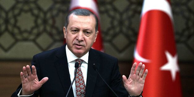 Turkish President Recep Tayyip Erdogan addresses a meeting of local administrators at his palace in Ankara, Turkey, Wedesday, Feb. 10, 2016. Erdogan has ratcheted up his criticism of the United States for not recognizing Syrian Kurdish forces as