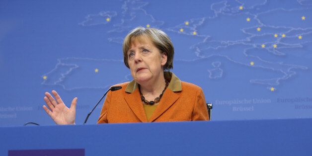 German Chancellor Angela Merkel gestures while speaking during a media conference at an EU summit in Brussels on Tuesday, March 8, 2016. European Union leaders said early Tuesday they reached the outlines for a possible deal with Ankara to return thousands of migrants to Turkey and said they were confident a full agreement could be reached at a summit next week. (AP Photo/Francois Walshaerts)
