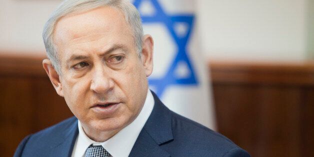 Israeli Prime Minister Benjamin Netanyahu speaks during the weekly cabinet meeting in Jerusalem. Sunday, Feb. 14, 2016. (AP Photo/Dan Balilty, Pool)
