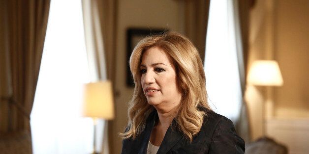 Fofi Gennimata, leader of the PASOK party, arrives at the presidential palace to attend a meeting with the Greek president and leaders of Greek political parties, commemorating the 41st anniversary of the country's restoration of democracy, in Athens, Greece, on Friday, July 24, 2015. After tapping a 7 billion-euro ($7.7 billion) bridge loan to avoid defaulting on the European Central Bank this month, Greek Prime Minister Alexis Tsipras is racing to complete negotiations on a third bailout in fi
