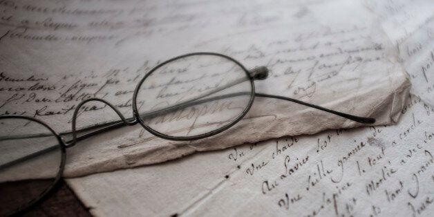 Antique eyeglasses and letters