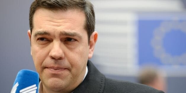 Greece's Prime minister Alexis Tsipras speaks to the press as he arrives for an EU summit meeting, at the European Union headquarters in Brussels, on February 18, 2016. EU leaders head into a make-or-break summit sharply divided over difficult compromises needed to avoid Britain becoming the first country to crash out of the bloc. AFP PHOTO / THIERRY CHARLIER / AFP / THIERRY CHARLIER (Photo credit should read THIERRY CHARLIER/AFP/Getty Images)