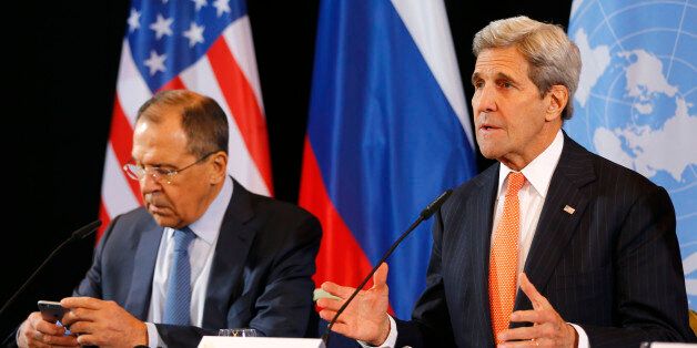 U.S. Secretary of State John Kerry, right, and Russian Foreign Minister Sergey Lavrov attend a news conference after the International Syria Support Group (ISSG) meeting in Munich, Germany, Friday, Feb. 12, 2016. Talks aimed at narrowing differences over Syria and keeping afloat diplomacy to end its civil war have gotten under way in Munich. (AP Photo/Matthias Schrader)