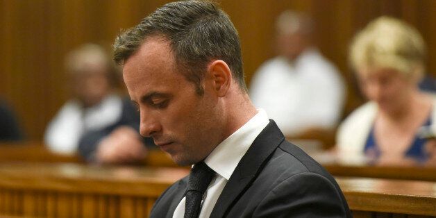 Oscar Pistorius sits in the dock at a courtroom of the North Gauteng High Court in Pretoria, South Africa, Tuesday Dec. 8, 2015. Pistorius arrived in the South African courtroom, where he is expected to apply for bail following his conviction for murdering girlfriend Reeva Steenkamp. (AP Photo/Herman Verwey, Pool)