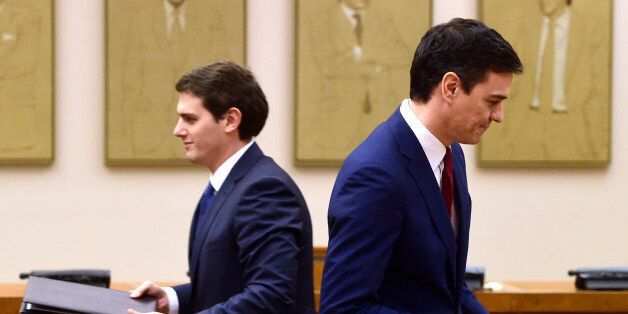 Leader of Spanish Socialist Party (PSOE) Pedro Sanchez (R) and leader of center-right party Ciudadanos, Albert Rivera hold documents to sign an agreement to support the socialist leader as candidate to lead the new Spanish government, in Madrid on February, 24, 2016 Spain's Socialists, racing to end weeks of political deadlock following inconclusive elections, announced today that the centrist Ciudadanos party has agreed to back their candidate for prime minister during the upcoming March, 2 investiture session. / AFP / Pierre-Philippe MARCOU (Photo credit should read PIERRE-PHILIPPE MARCOU/AFP/Getty Images)