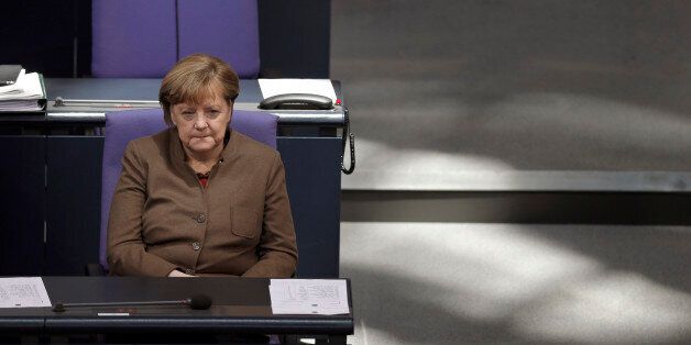 German Chancellor Angela Merkel attends a meeting of the German Federal Parliament, Bundestag, at the Reichstag building in Berlin, Germany, Thursday, Feb. 25, 2016. (AP Photo/Michael Sohn)