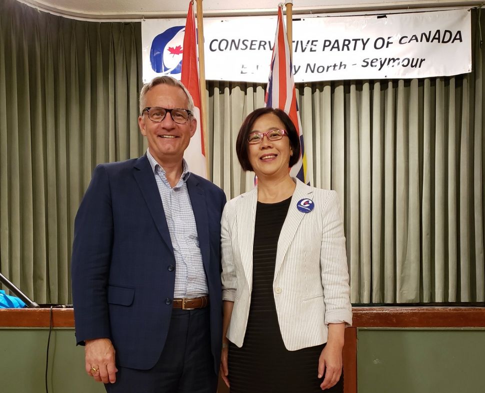 Heather Leung, the Conservative candidate in Burnaby North-Seymour, is seen with veteran B.C. MP Ed Fast.