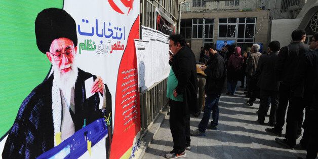 TEHRAN, IRAN - FEBRUARY 26: Iranians line up in long lines to vote in key elections for Parliament and the Assembly of Experts in Tehran, Iran, on February 26, 2016. The vote is essentially a referendum on the agenda of centrist President Hassan Rouhani, whose allies are trying to ease the grip of hardliners over many levers of government. The result in the 290-member Majlis, or parliament, and the 88-member clerical Assembly which could choose Iran's next supreme leader, if Ayatollah Ali Khamenei passes in the next 8 years Ã could shape Iran for years to come. (Photo by Scott Peterson/Getty Images)