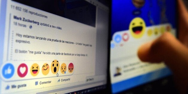 A picture taken on October 9, 2015 in Madrid shows a computer screen displaying the Facebook webpage with the new 'Reactions' options as an extension of the 'like' button, to give people more ways to easily signal how they feel. Facebook will begin testing this new feature allowing users in Ireland and Spain to express a range of emotions on posts starting today, but there will be no 'dislike' button, the social network said. AFP PHOTO / GERARD JULIEN (Photo credit should read GERARD JULIEN,GERARD JULIEN/AFP/Getty Images)